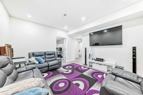 199 Kinniburgh Road, Chestermere, AB - Indoor Photo Showing Living Room