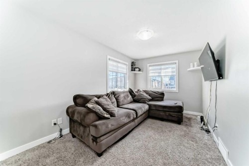 199 Kinniburgh Road, Chestermere, AB - Indoor Photo Showing Living Room
