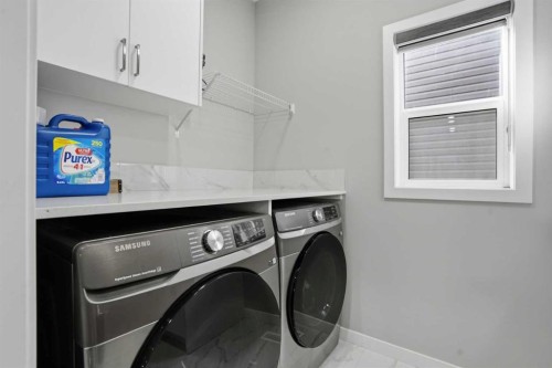 276 Calhoun Crescent Ne, Calgary, AB - Indoor Photo Showing Laundry Room