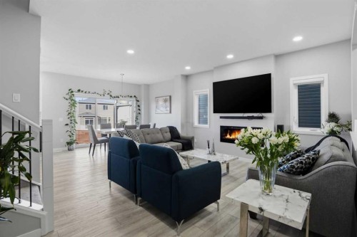 276 Calhoun Crescent Ne, Calgary, AB - Indoor Photo Showing Living Room With Fireplace