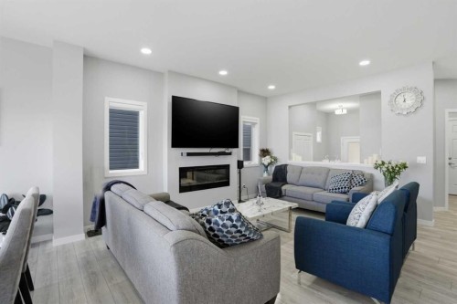 276 Calhoun Crescent Ne, Calgary, AB - Indoor Photo Showing Living Room With Fireplace