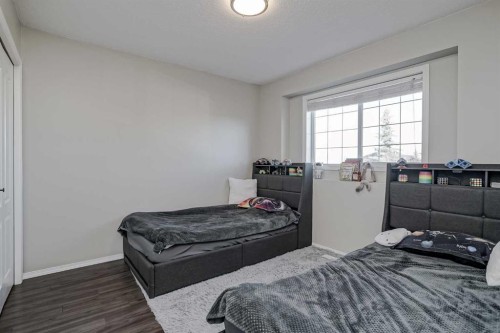 67 Silver Springs Way Nw, Airdrie, AB - Indoor Photo Showing Bedroom