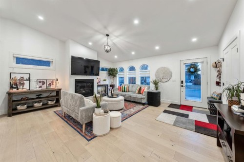 4008 5 Avenue Sw, Calgary, AB - Indoor Photo Showing Other Room With Fireplace
