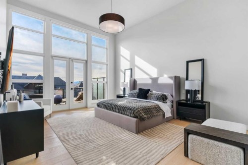 100 Elkton Close Sw, Calgary, AB - Indoor Photo Showing Bedroom