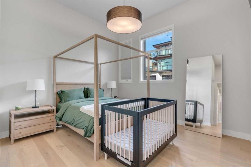 100 Elkton Close Sw, Calgary, AB - Indoor Photo Showing Bedroom