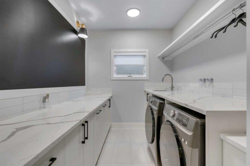 100 Elkton Close Sw, Calgary, AB - Indoor Photo Showing Laundry Room