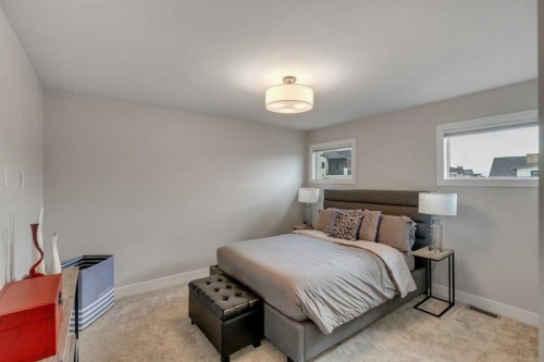 100 Elkton Close Sw, Calgary, AB - Indoor Photo Showing Bedroom