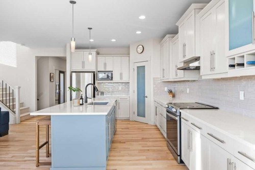 59 Cortina Way Sw, Calgary, AB - Indoor Photo Showing Kitchen With Upgraded Kitchen