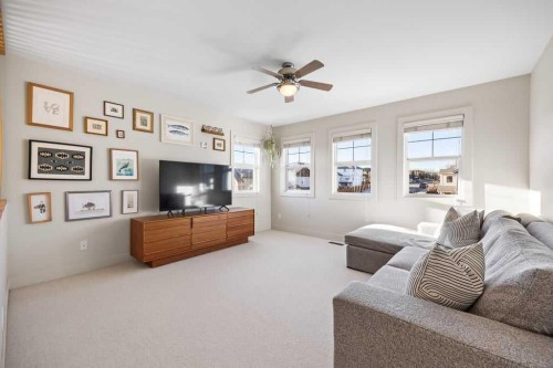 59 Cortina Way Sw, Calgary, AB - Indoor Photo Showing Living Room