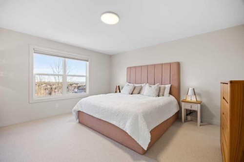 59 Cortina Way Sw, Calgary, AB - Indoor Photo Showing Bedroom