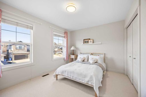 59 Cortina Way Sw, Calgary, AB - Indoor Photo Showing Bedroom