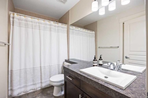59 Cortina Way Sw, Calgary, AB - Indoor Photo Showing Bathroom