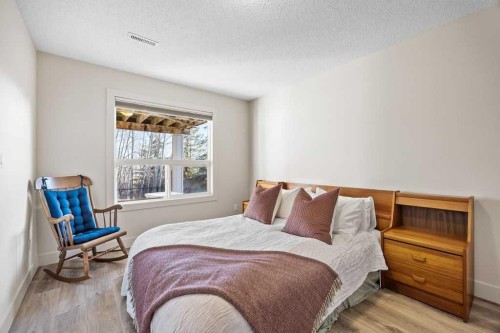 59 Cortina Way Sw, Calgary, AB - Indoor Photo Showing Bedroom