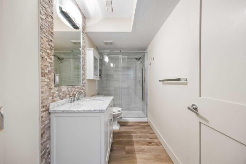 59 Cortina Way Sw, Calgary, AB - Indoor Photo Showing Bathroom