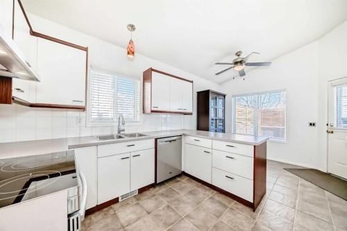 55 Shawbrooke Crescent Sw, Calgary, AB - Indoor Photo Showing Kitchen With Double Sink