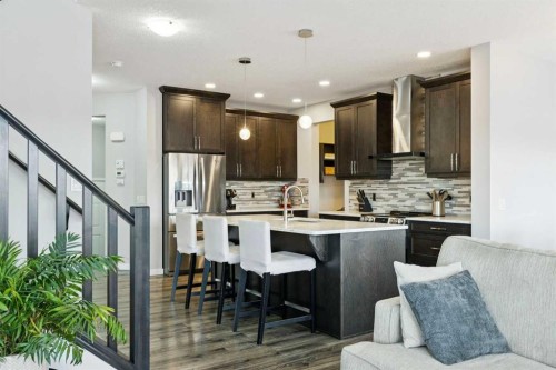 331 Hillcrest Heights Sw, Airdrie, AB - Indoor Photo Showing Kitchen With Upgraded Kitchen