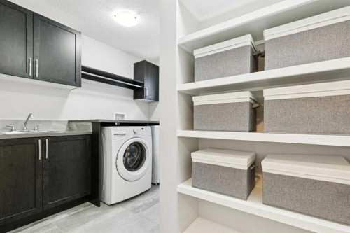 331 Hillcrest Heights Sw, Airdrie, AB - Indoor Photo Showing Laundry Room