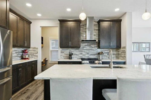 331 Hillcrest Heights Sw, Airdrie, AB - Indoor Photo Showing Kitchen With Upgraded Kitchen