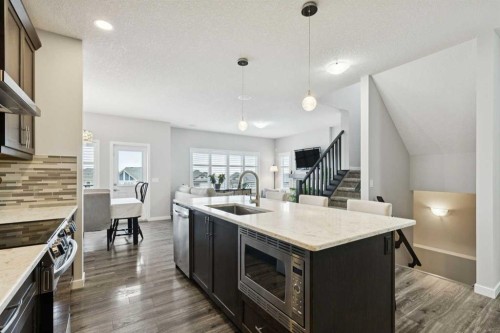 331 Hillcrest Heights Sw, Airdrie, AB - Indoor Photo Showing Kitchen With Upgraded Kitchen