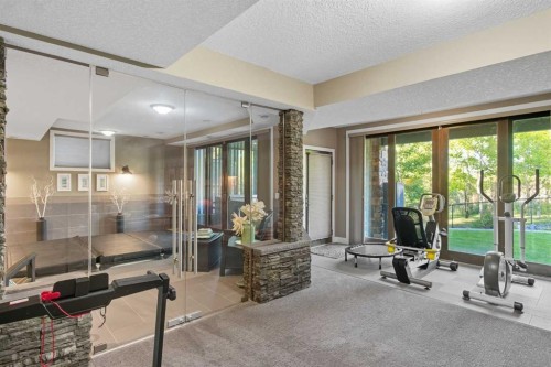 41 Evergreen Mount Sw, Calgary, AB - Indoor Photo Showing Gym Room