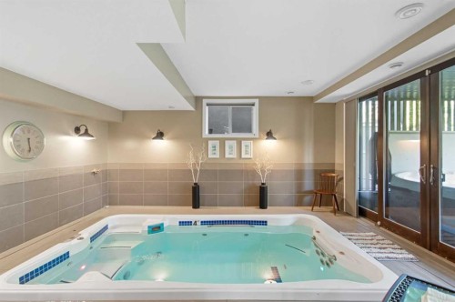 41 Evergreen Mount Sw, Calgary, AB - Indoor Photo Showing Other Room With In Ground Pool