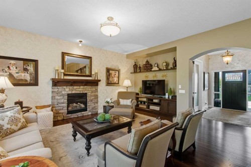 41 Evergreen Mount Sw, Calgary, AB - Indoor Photo Showing Living Room With Fireplace