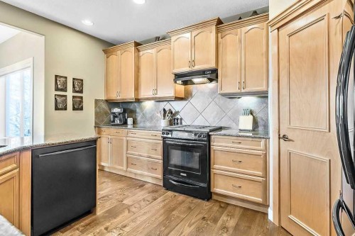 208 Tuscany Ravine View Nw, Calgary, AB - Indoor Photo Showing Kitchen