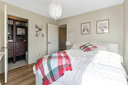 208 Tuscany Ravine View Nw, Calgary, AB - Indoor Photo Showing Bedroom