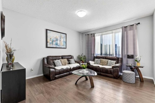 140 Savanna Road Ne, Calgary, AB - Indoor Photo Showing Living Room