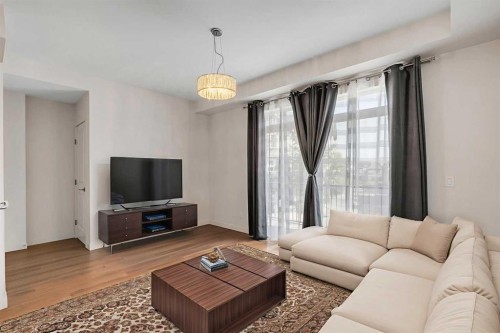 958 Sherwood Boulevard Nw, Calgary, AB - Indoor Photo Showing Living Room