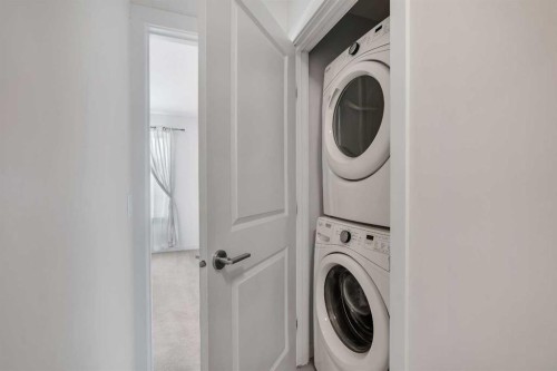958 Sherwood Boulevard Nw, Calgary, AB - Indoor Photo Showing Laundry Room