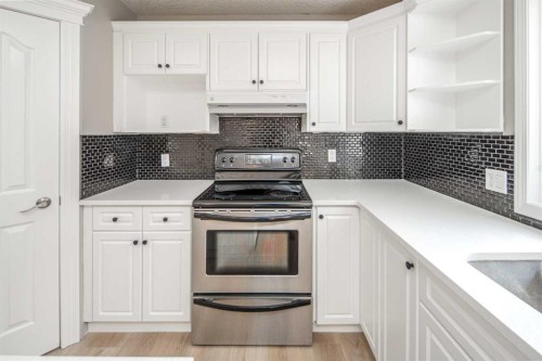 79 Hamptons Heights Nw, Calgary, AB - Indoor Photo Showing Kitchen
