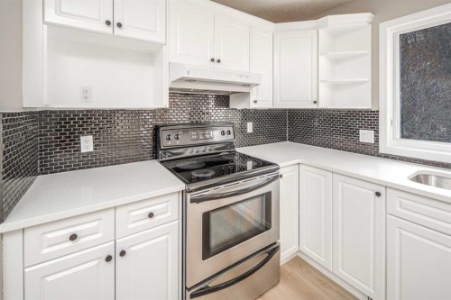 79 Hamptons Heights Nw, Calgary, AB - Indoor Photo Showing Kitchen
