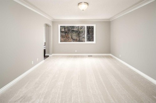 79 Hamptons Heights Nw, Calgary, AB - Indoor Photo Showing Other Room