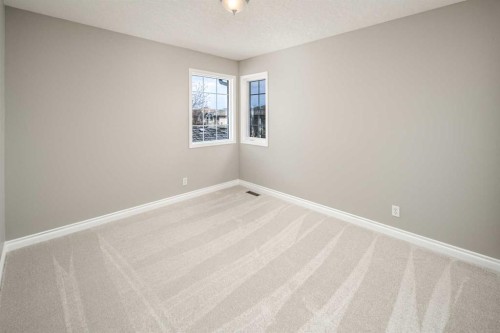 79 Hamptons Heights Nw, Calgary, AB - Indoor Photo Showing Other Room