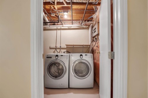 23-73 Glenbrook Crescent, Cochrane, AB - Indoor Photo Showing Laundry Room