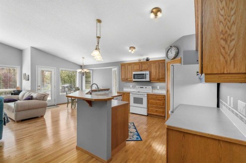 310 Riverside Garden Nw, High River, AB - Indoor Photo Showing Kitchen