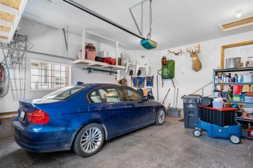 310 Riverside Garden Nw, High River, AB - Indoor Photo Showing Garage