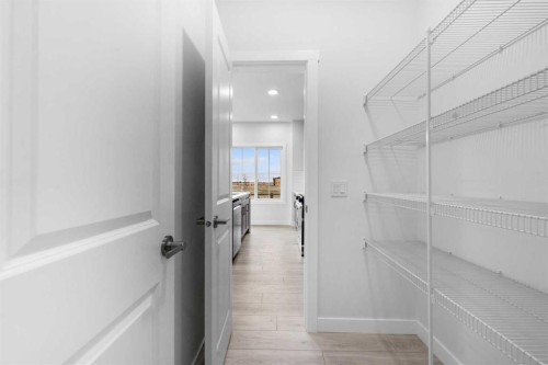 142 Sunstone Way, Balzac, AB - Indoor Photo Showing Other Room