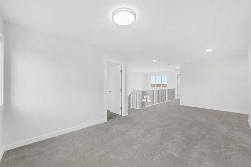 142 Sunstone Way, Balzac, AB - Indoor Photo Showing Other Room