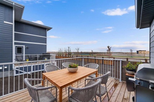 142 Sunstone Way, Balzac, AB - Outdoor With Deck Patio Veranda With Exterior