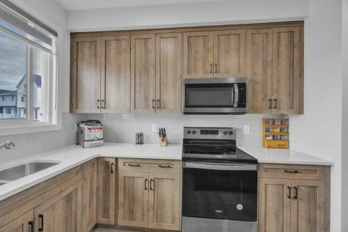 1612 Rangeview Drive Se, Calgary, AB - Indoor Photo Showing Kitchen