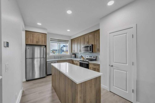 1612 Rangeview Drive Se, Calgary, AB - Indoor Photo Showing Kitchen With Stainless Steel Kitchen