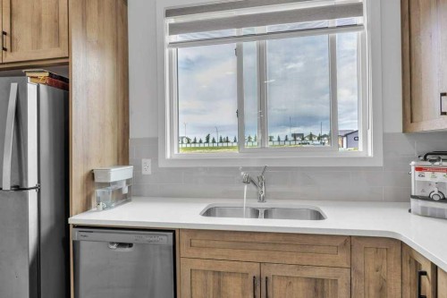 1612 Rangeview Drive Se, Calgary, AB - Indoor Photo Showing Kitchen With Double Sink
