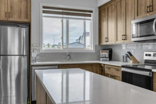 1612 Rangeview Drive Se, Calgary, AB - Indoor Photo Showing Kitchen With Stainless Steel Kitchen