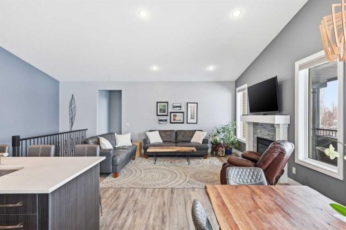 2026 High Country Rise Nw, High River, AB - Indoor With Fireplace