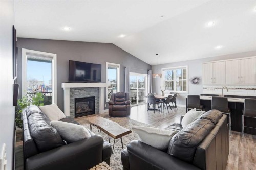 2026 High Country Rise Nw, High River, AB - Indoor Photo Showing Living Room With Fireplace