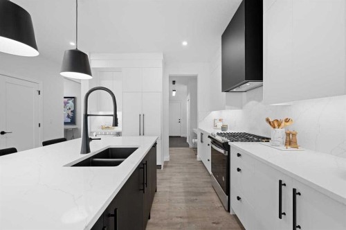 447 Dawson Terrace, Chestermere, AB - Indoor Photo Showing Kitchen With Double Sink With Upgraded Kitchen