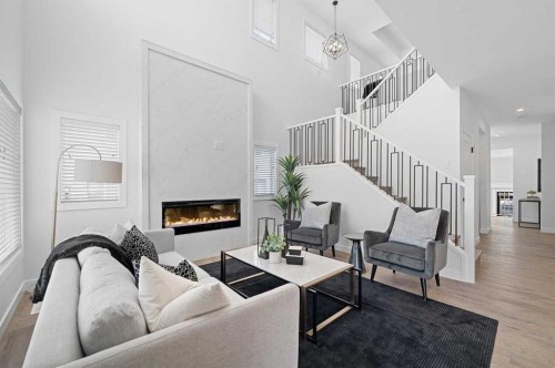 447 Dawson Terrace, Chestermere, AB - Indoor Photo Showing Living Room With Fireplace
