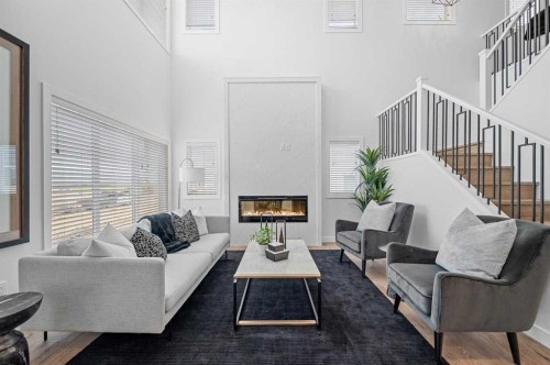 447 Dawson Terrace, Chestermere, AB - Indoor Photo Showing Living Room With Fireplace